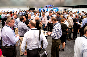 A photo of people chatting with each other.
