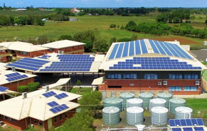 A view the sky looking down at Bundaberg Christian College's water harvesting/tank system and rooftop solar panel system.